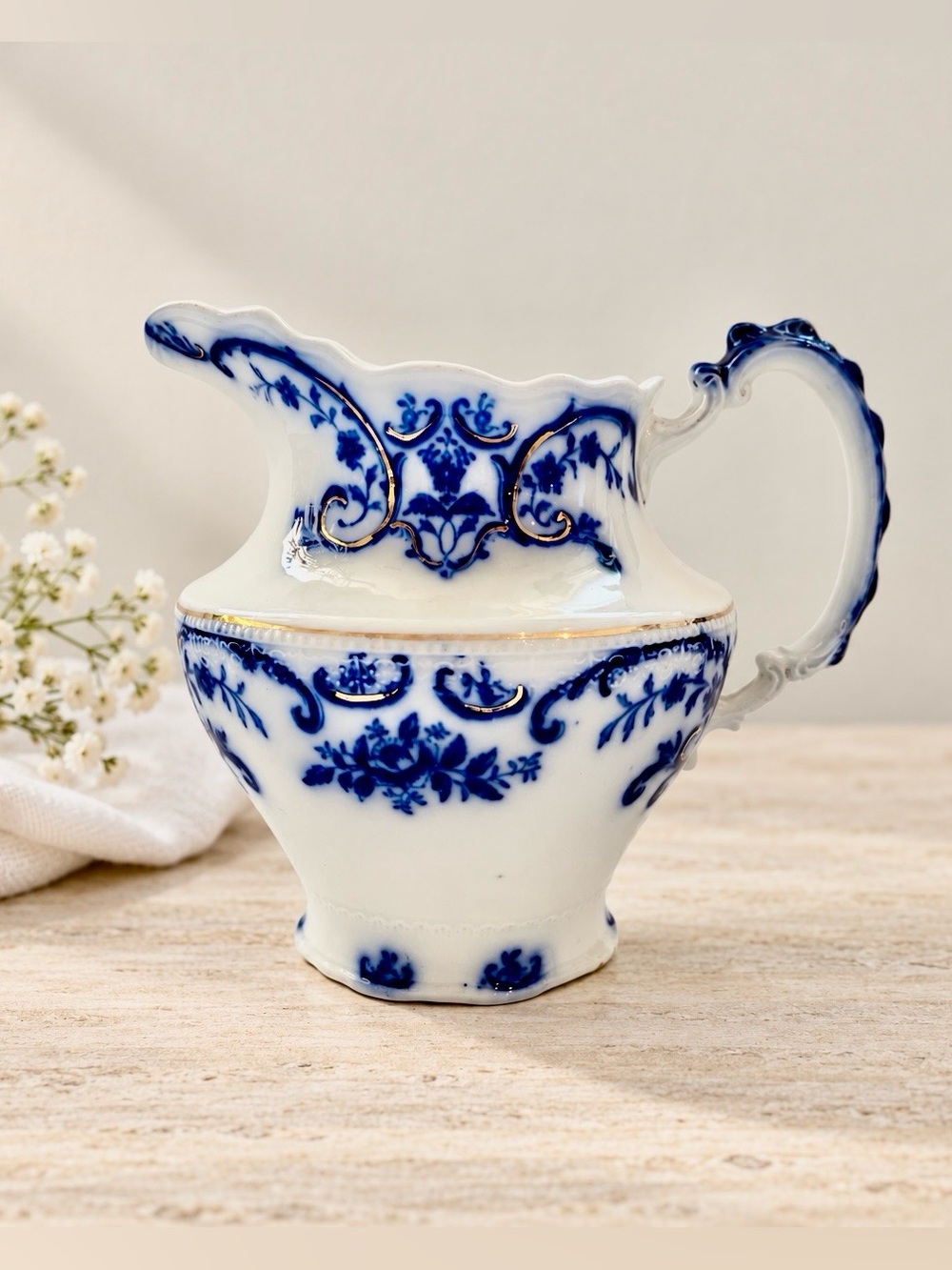 Antique W.H. Grindley Flow Blue Creamer with Gold Trim